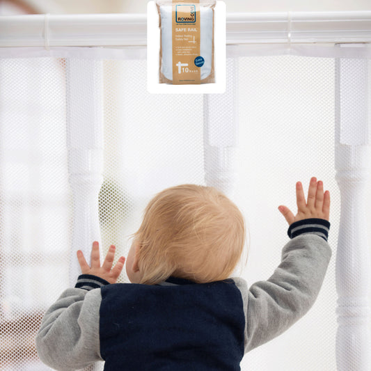 Roving Cove Indoor and Outdoor Banister Guard and Railing Safety Net for baby proofing stairway railing, deck, patio, balcony and beyond. Keep your babies, pets and toys from falling through banisters. Available on Amazon. 