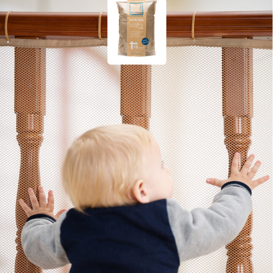 Roving Cove Indoor and Outdoor Banister Guard and Railing Safety Net for baby proofing stairway railing, deck, patio, balcony and beyond. Keep your babies, pets and toys from falling through banisters. Available on Amazon. 